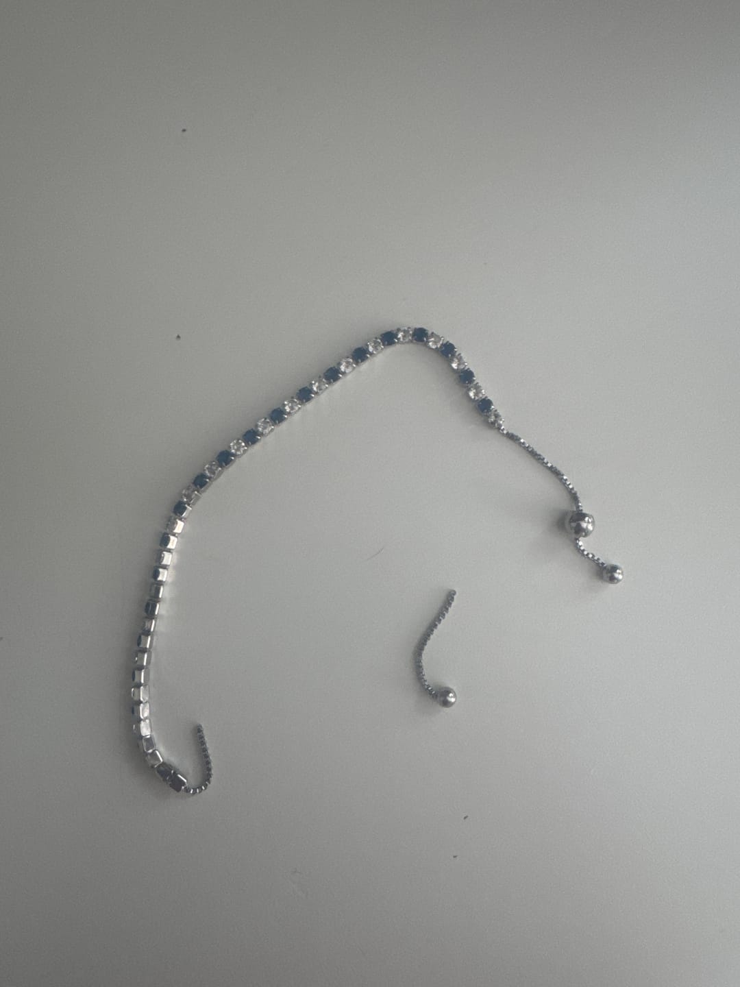 Customer photo review of BRACCIALE ACCIAIO TENNIS E ZIRCONI BIANCHI E ROSSI MM 3,00 CHIUSURA A SCORRERE