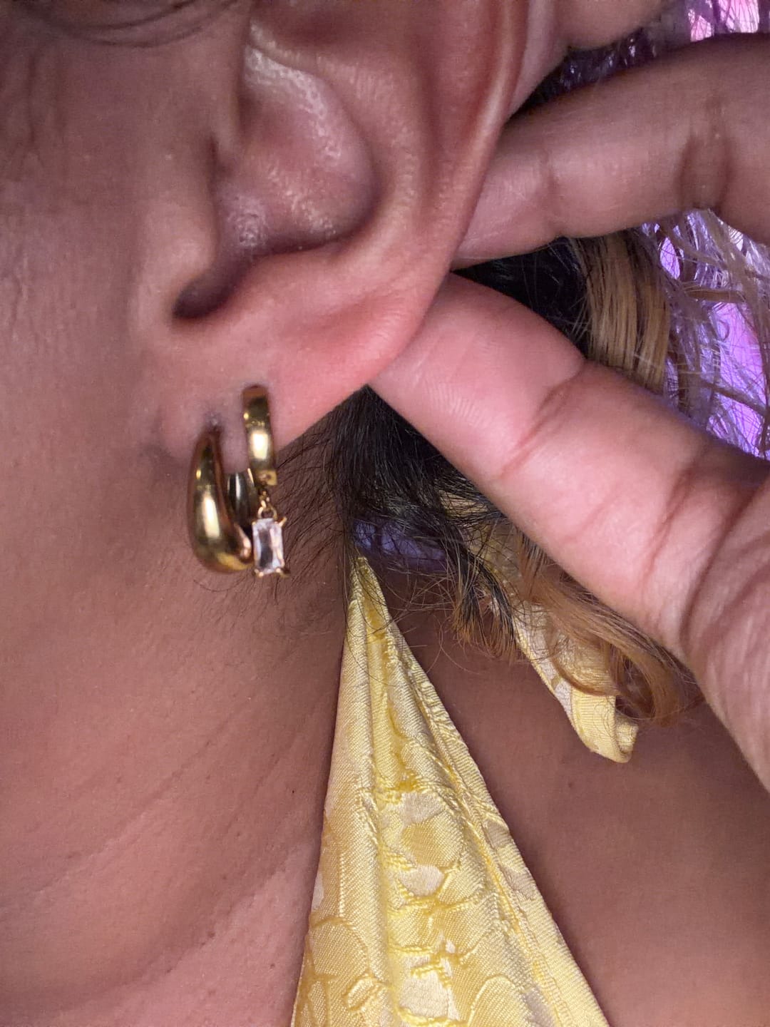 Customer photo review of Bella Birthstone Huggies Earrings — April