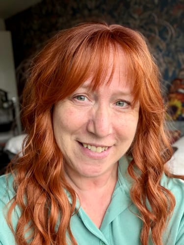 Customer photo review of JBEXTENSION 22 Inches Scalpiana Long Wave Copper 3.5X4 Hard Silky Top Natural Scalp Effect Wig with Bangs OSSIE COPPER