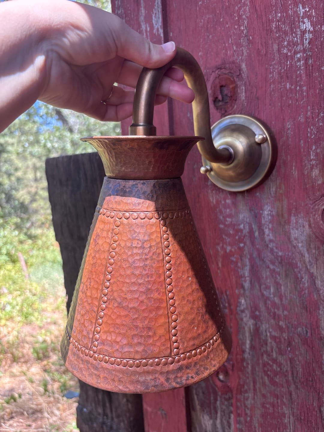 Customer photo review of Handmade Hammered Copper Wall Sconce – Rustic Cone Shade Light