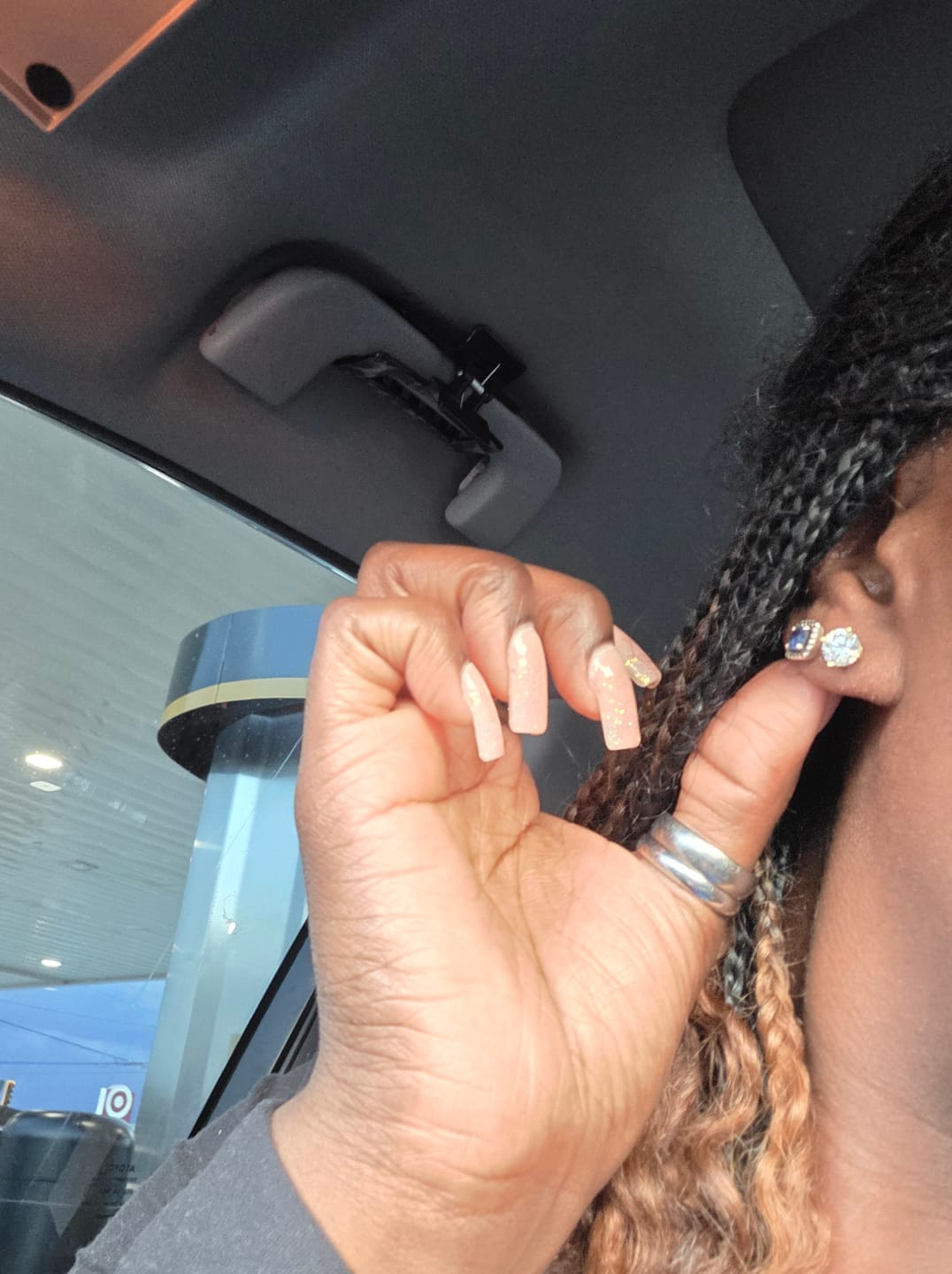 Customer photo review of Round Cut Moissanite Stud Earrings