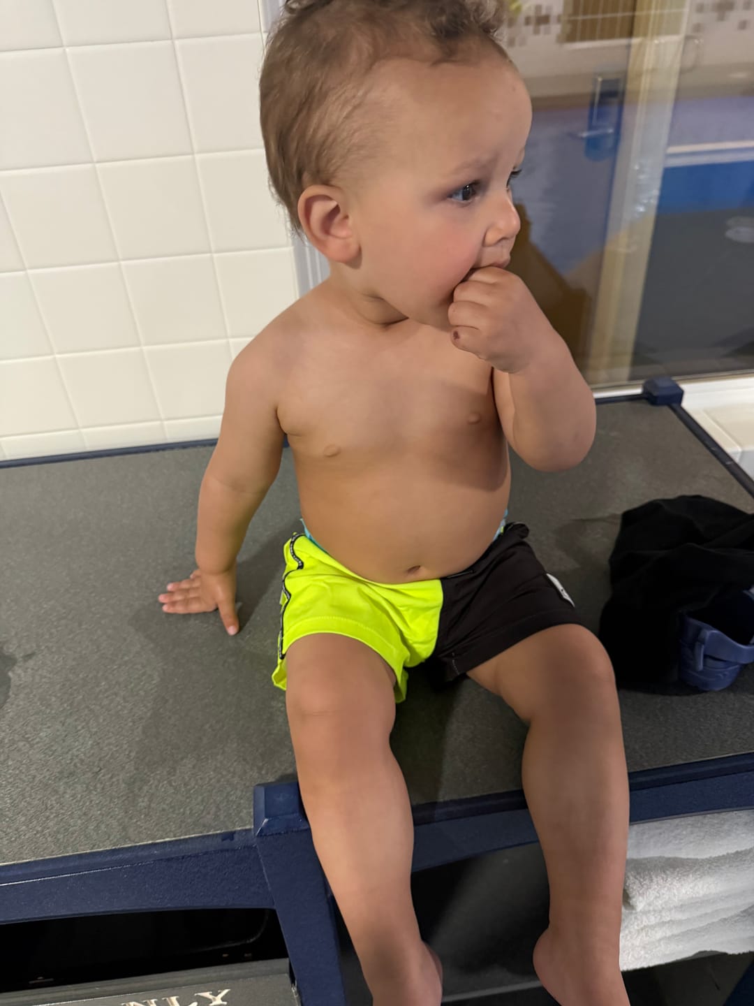 Customer photo review of Hybrid Swim Trunks in Neon Electric Lime + Black Colorblock
