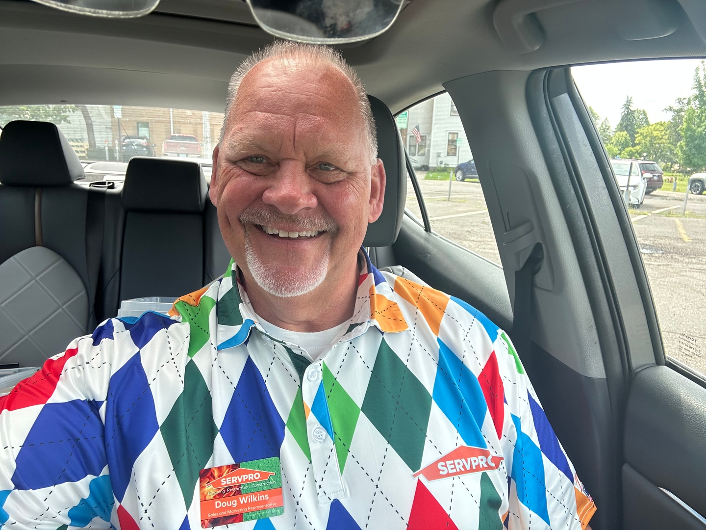Men's  Argyle Colorful Polo golf outfit inspiration from Golf Gentry