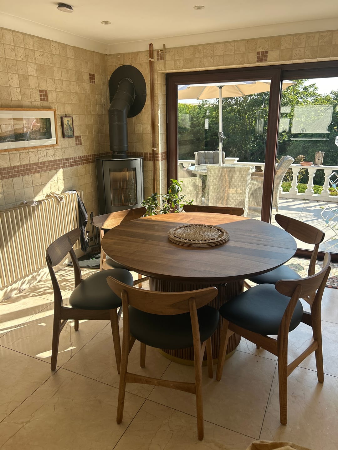Customer photo review of Chiara Extendable Walnut Round Dining Table in Chocolate