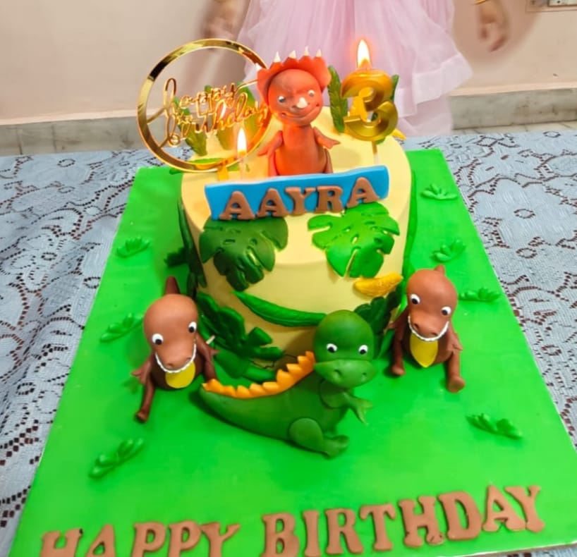 Customer photo review of Baby Dino Themed Cake