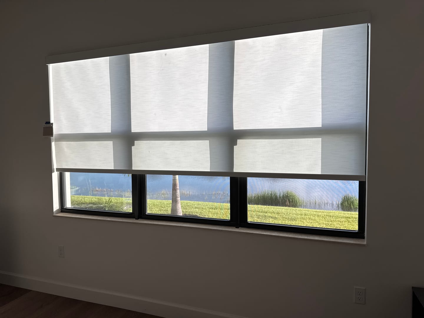 Customer photo review of Bringnox Motorized Light Filtering Roller Shades 70% Blackout Essential