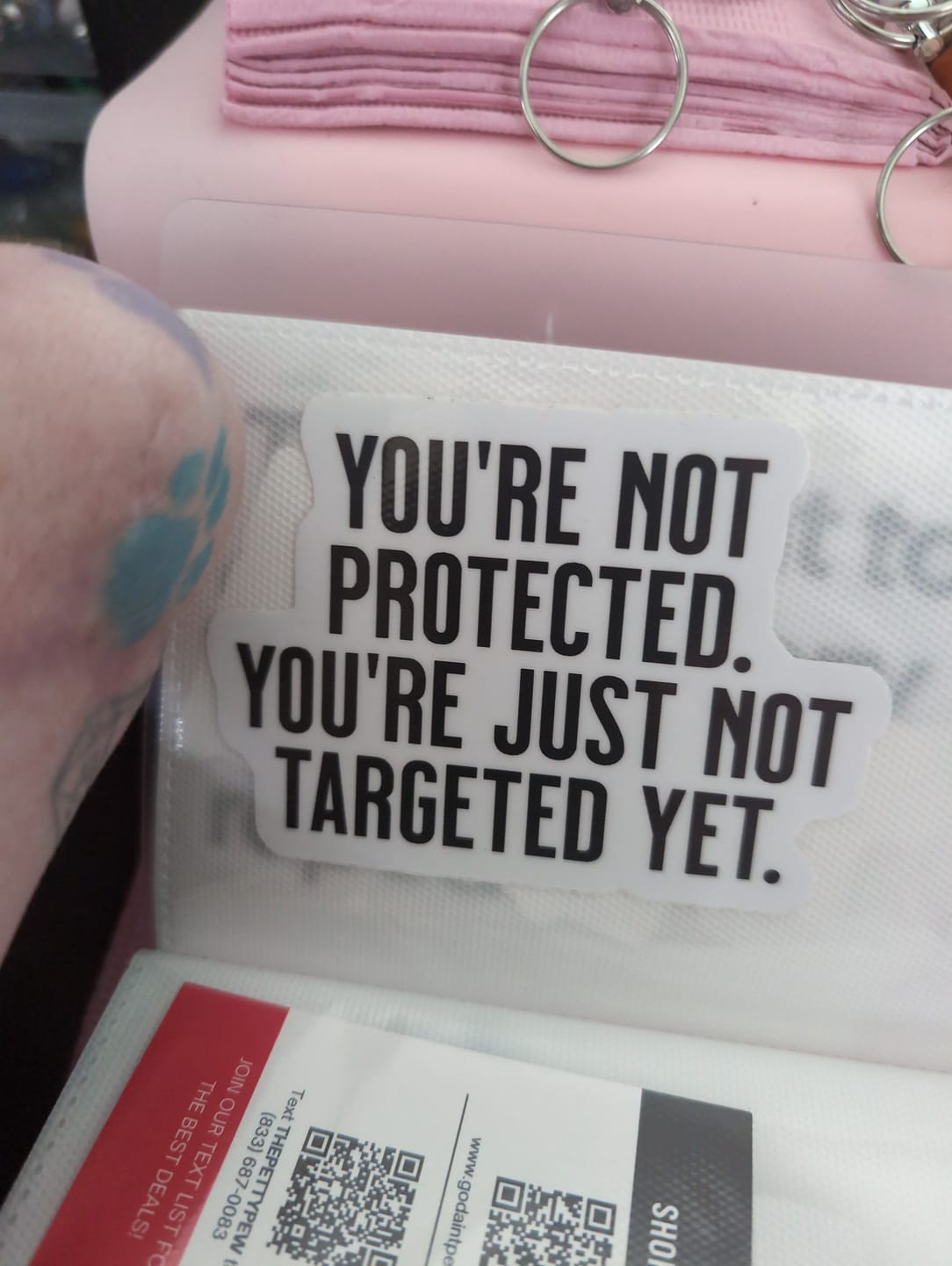 Customer photo review of You're not Protected. You're just Not Targeted Yet Black/White Die Cut STICKER