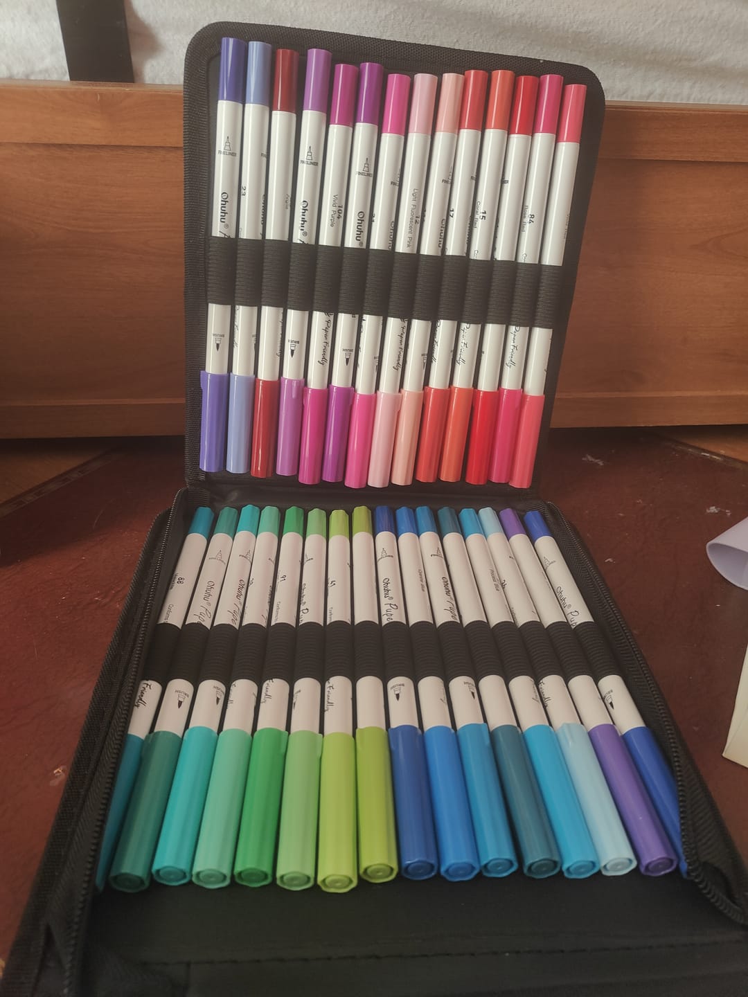Customer photo review of Ohuhu Pupe Paper-friendly (No Peeling) Brush and Fineliner Dual Tips 60 Colors Water-based Coloring Markers
