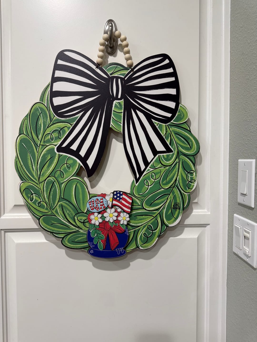 Customer photo review of Black and White Bow Wreath Door Hanger / add mini velcro