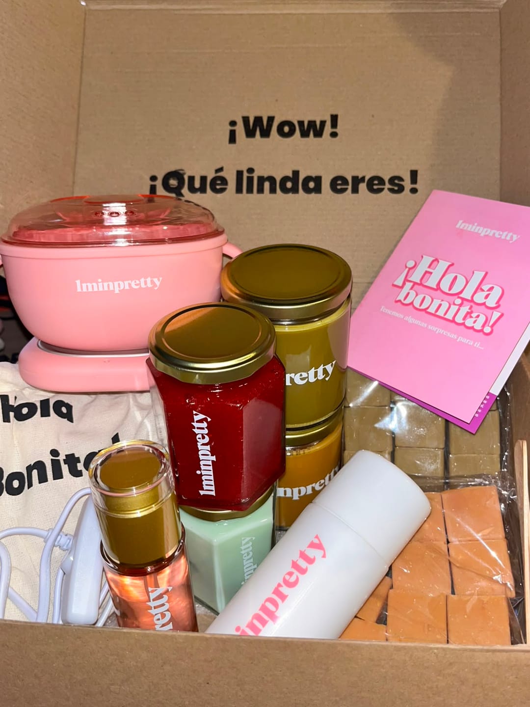 Customer photo review of Kit 1minpretty: 2 tarros de cera + fundidor + refill + exfoliante + crema pepino + agua rosas + talco para depilar con envío gratis mx