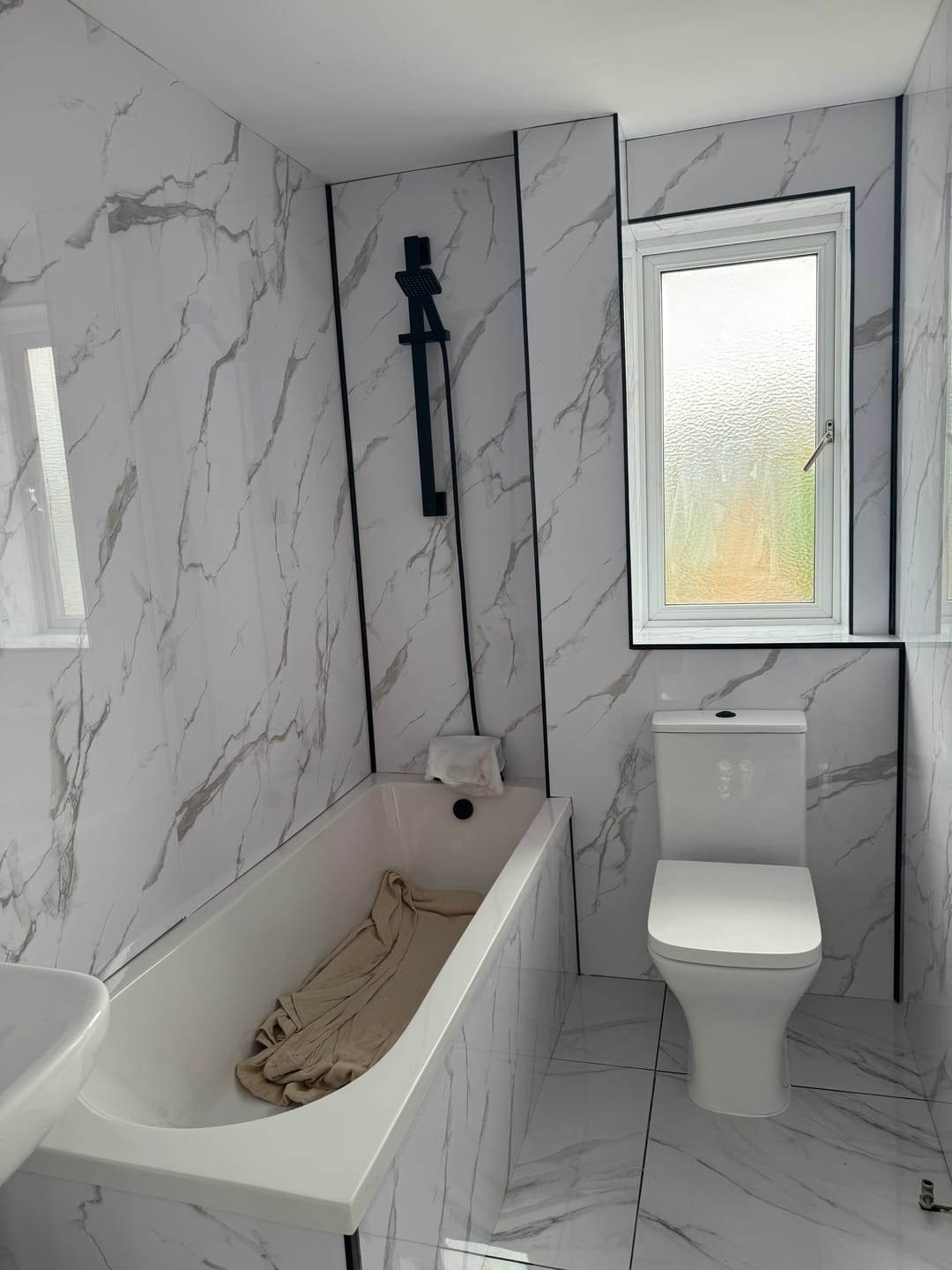 Customer photo review of Premium Carrara White Marble Gloss Shower Wall Panel - 1M x 2.4M