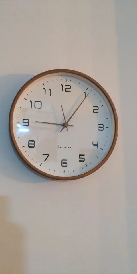 Customer photo review of Nordic Solid Wood Wall Clock
