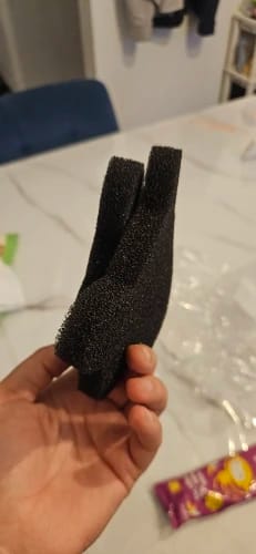 Customer photo review of FluffCatcher™ — Reusable Pet Hair Remover for Laundry (Cat-Shaped)