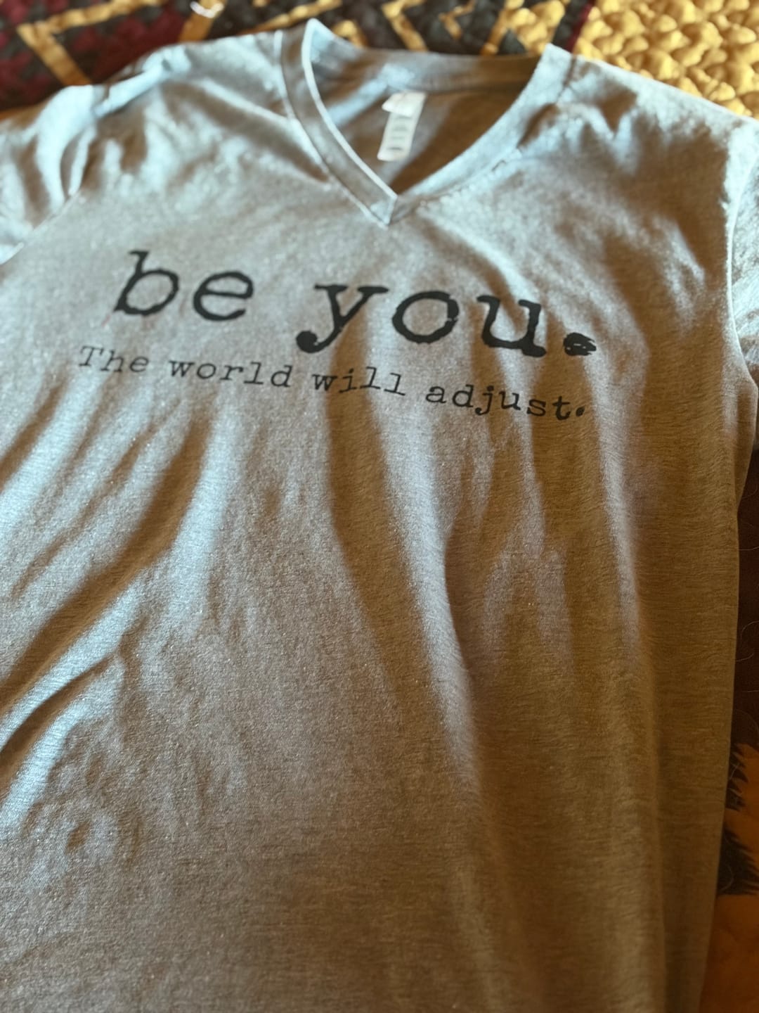 Customer photo review of Be You. The World Will Adjust V-neck Tee