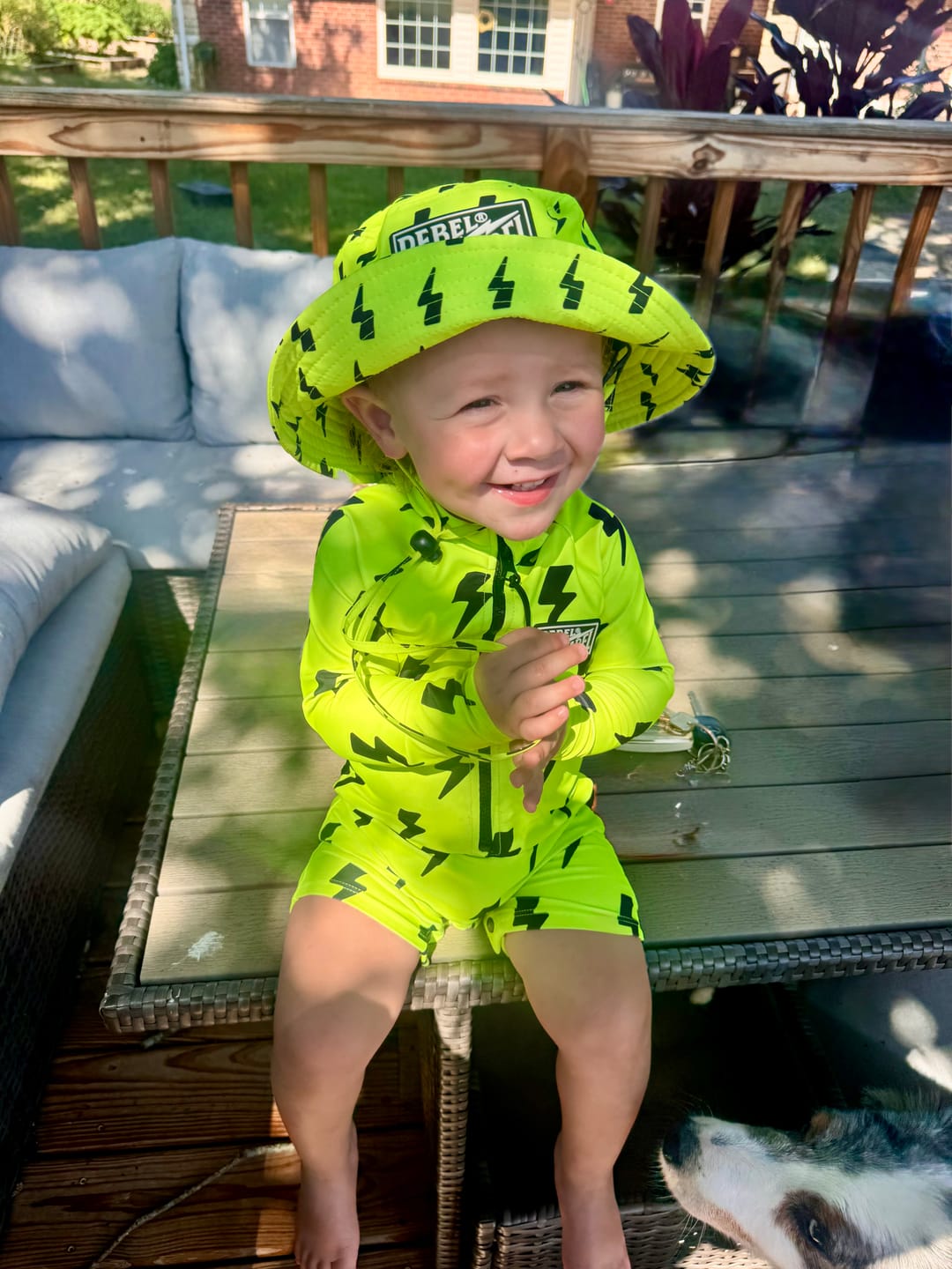 Customer photo review of UPF50+ Boys Swim Romper in Neon Electric Lime x Jagger