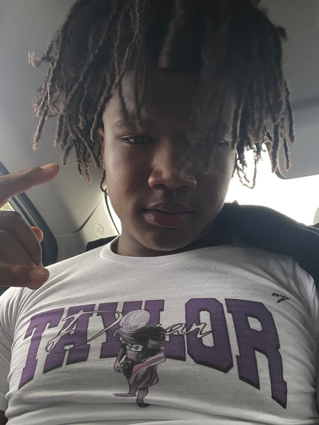 Customer photo review of Dequan Taylor YOUTH Graphic Tee