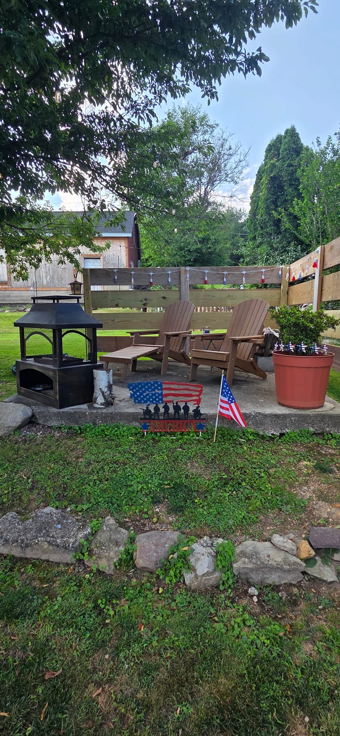 Customer photo review of Folding Adirondack Chair with Built in Footrest & Cup/Wine Holders King Size