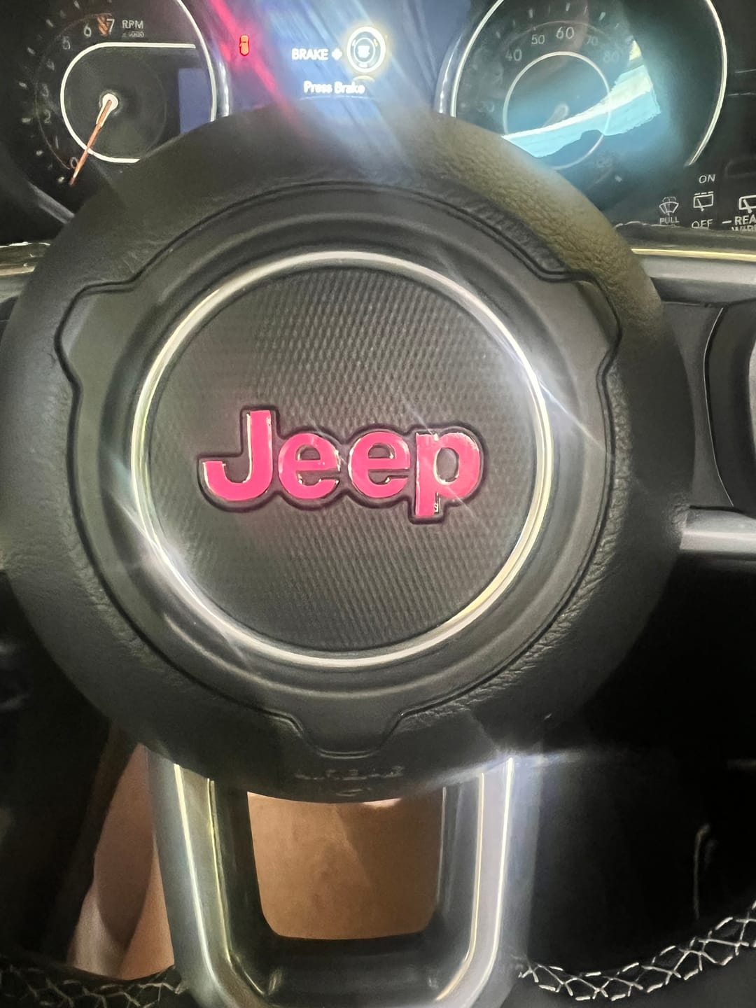 Customer photo review of JEEP Steering Wheel Emblem Overlay Decal — 30+ Colors & Designs (Flag, Topo, Animal, Solid)