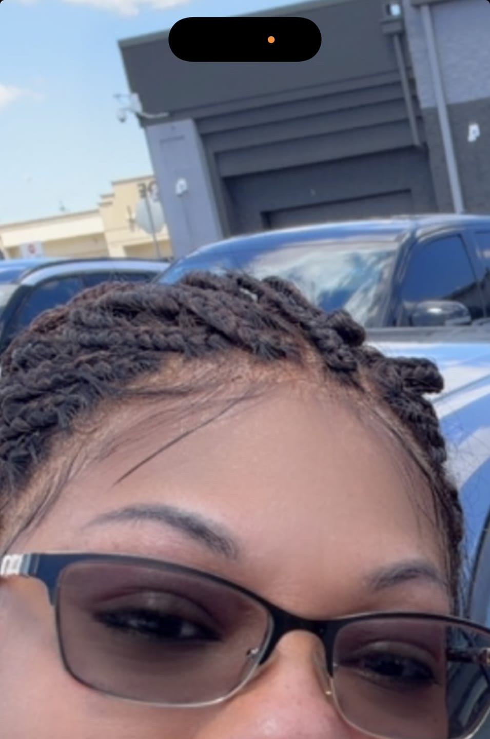 Customer photo review of Kora - Pre Bleached Human Hair Lace Lightweight Knotless Swiss HD Lace Box Braided Wig 100 Strands
