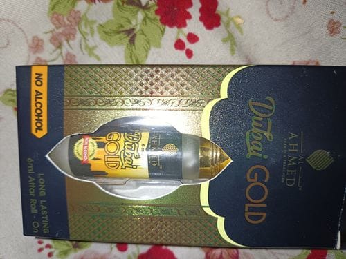 Customer photo review of Al Ahmed Dubai Gold Attar Roll on Perfume | Long lasting Fragrance Perfume For Men and Women | 100% Alcohol Free Attar Perfume | 6ml)