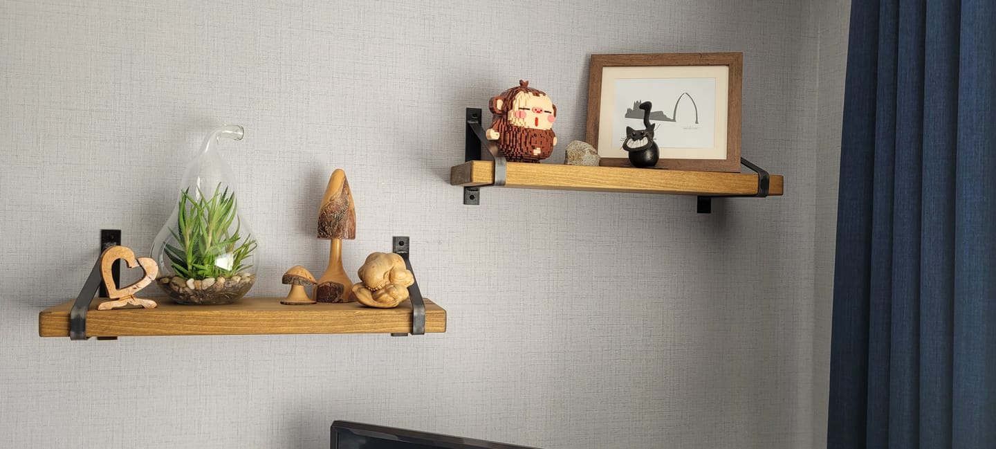 Customer photo review of Rustic Wooden Wall Shelves with Triangle Metal Wall Brackets