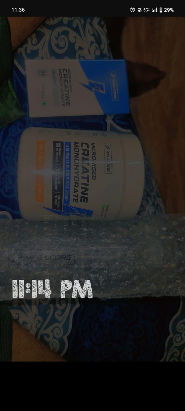 Customer photo review of Wellcore - Micronised Creatine Monohydrate (83 Servings, Tropical Tango) + Premium Glass Bottle