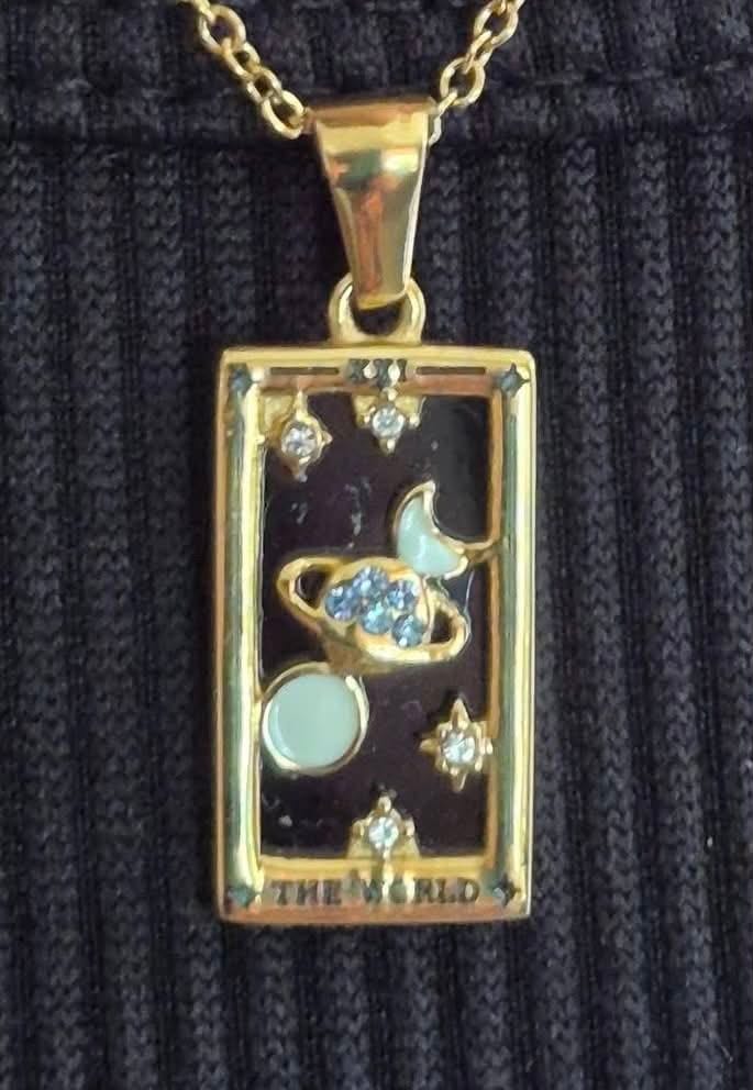 Customer photo review of The World - Tarot card Dainty 18k Necklace with Black Enamel