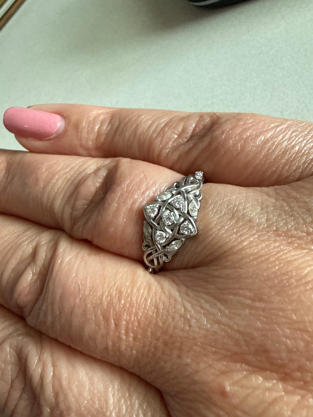 Customer photo review of Celtic Knot Moissanite Cluster Engagement Ring