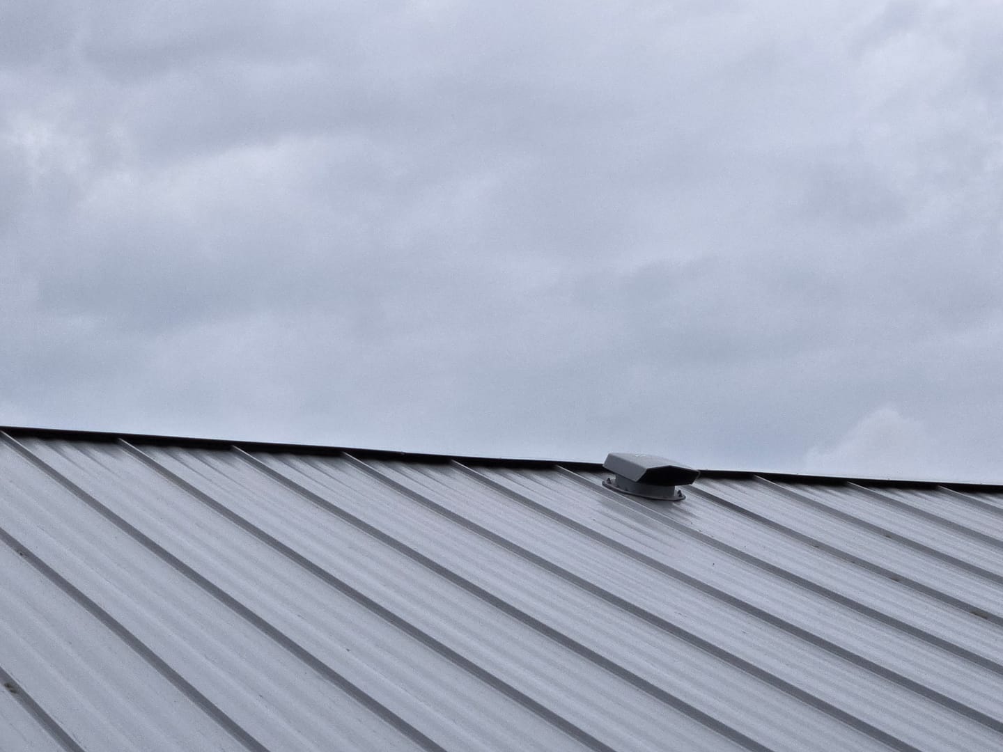 Customer photo review of Attic vent Ivent FLOW – Metal Standing Seam or Snap Lock Installation