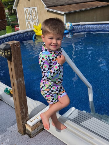 Customer photo review of Long Sleeve One Piece Zip Sunsuit Shortie