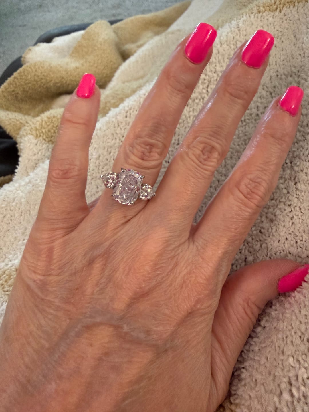 Customer photo review of Louily Luxury Three stone White Stone Cushion Cut Engagement Ring
