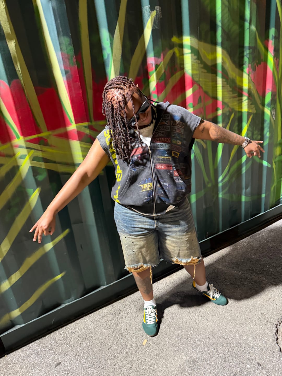 Customer photo review of Distressed Multi-Label Graphic Sleeveless Zip Hoodie