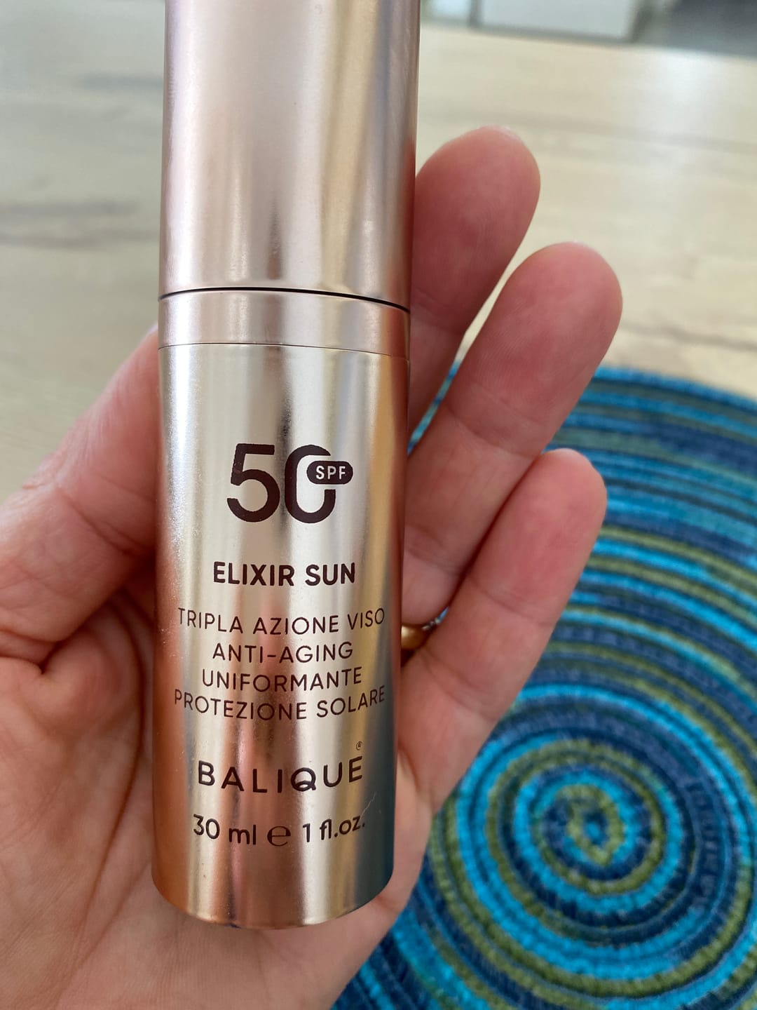 Customer photo review of ELIXIR SUN SPF50 - Siero Viso tripla azione