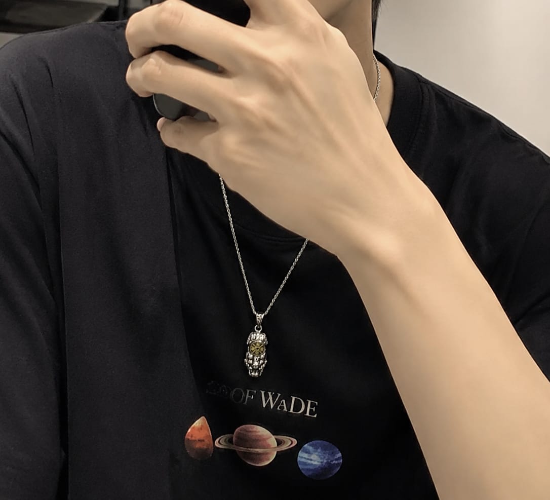 Customer photo review of FuAttract Fortune-Attracting Pixiu Amulet – Handcrafted Metal Protection Necklace