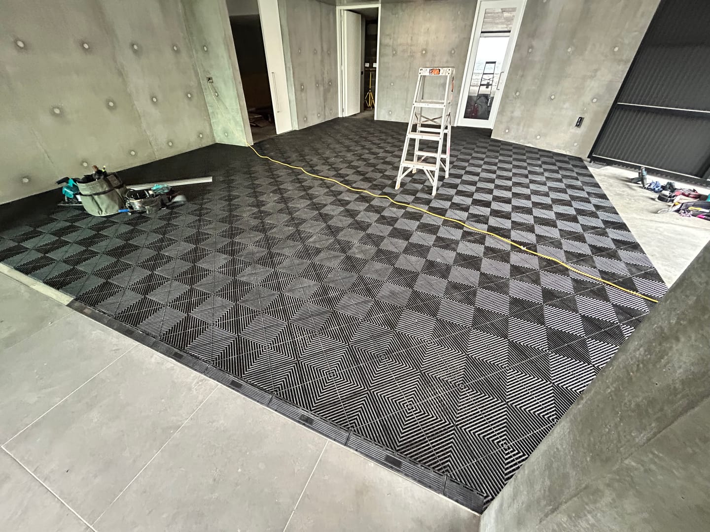 Customer photo review of Interlocking Garage Floor Tile Edges & Corner Pieces – Finishing Trim Edge Ramp for Modular Flooring