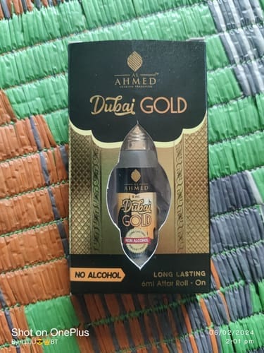 Customer photo review of Al Ahmed Dubai Gold Attar Roll on Perfume | Long lasting Fragrance Perfume For Men and Women | 100% Alcohol Free Attar Perfume | 6ml)