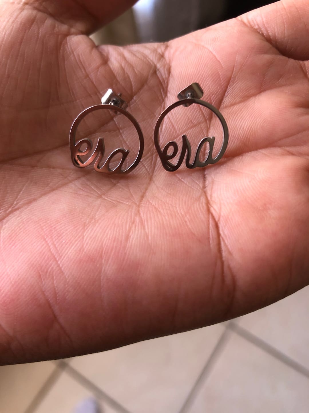 Customer photo review of Silver Era Logo Studs
