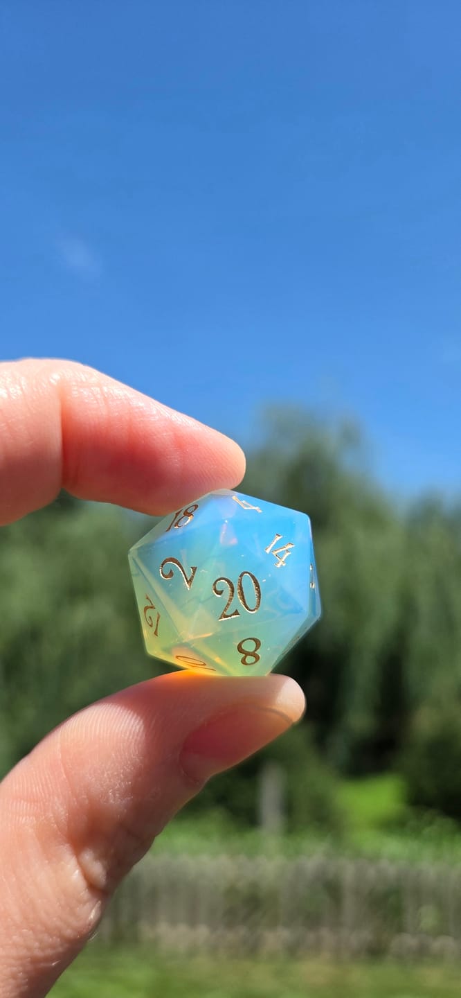 Customer photo review of URWizards D&D Engraved Gemstone D20 Dice