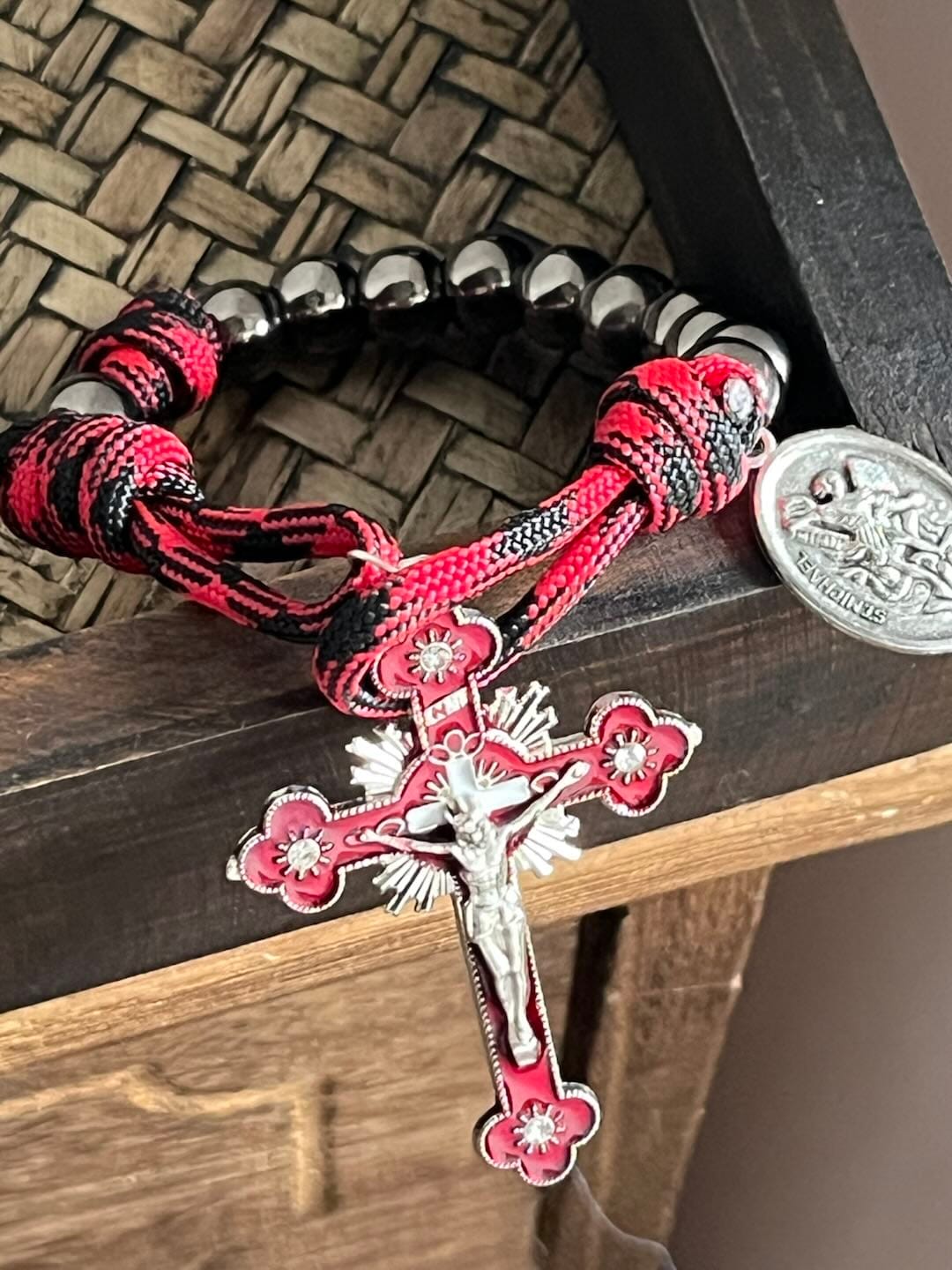 Customer photo review of Solacebeads Gunmetal Bead Car Rosary & Red Enamel Crucifix: Rooted In St. Michael Protection