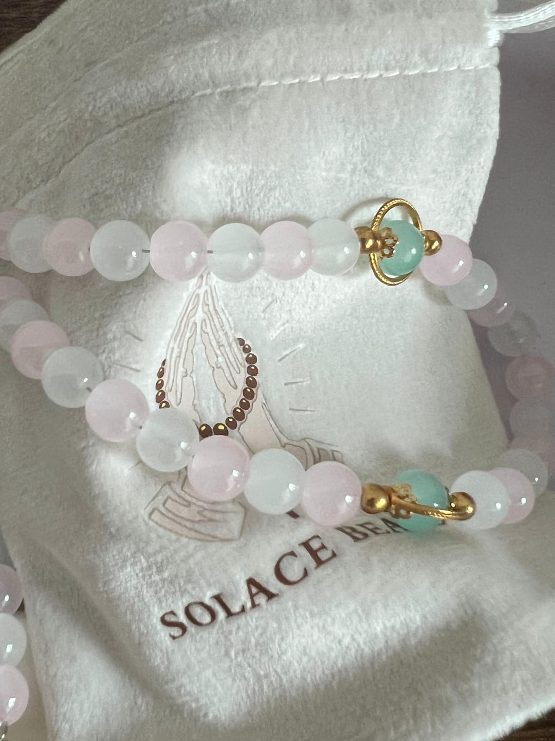 Customer photo review of SolaceBeads Artistic Pink & White Beaded Rosary: A Fusion of Colors & Sacred Symbols