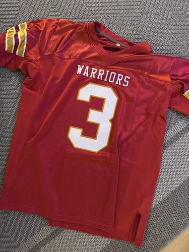 Reviewer's custom burgundy football jersey with 'WARRIORS' and number 3 stitched on the front.