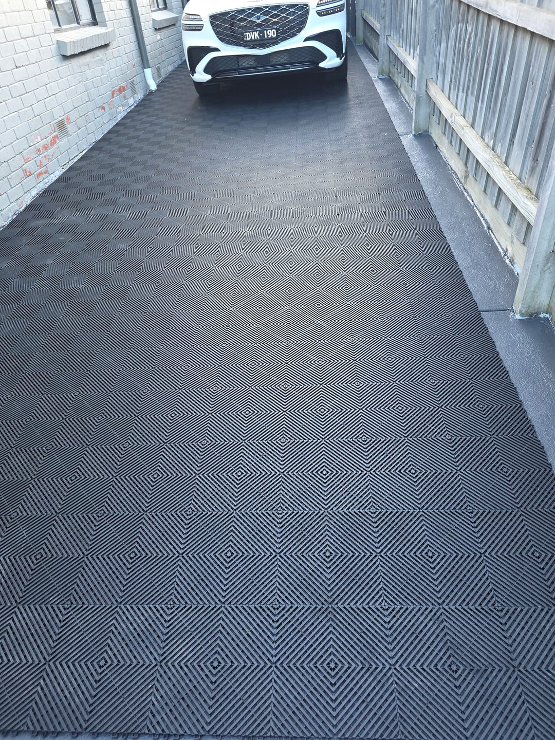 Customer photo review of Interlocking Garage Floor Tile Edges & Corner Pieces – Finishing Trim Edge Ramp for Modular Flooring