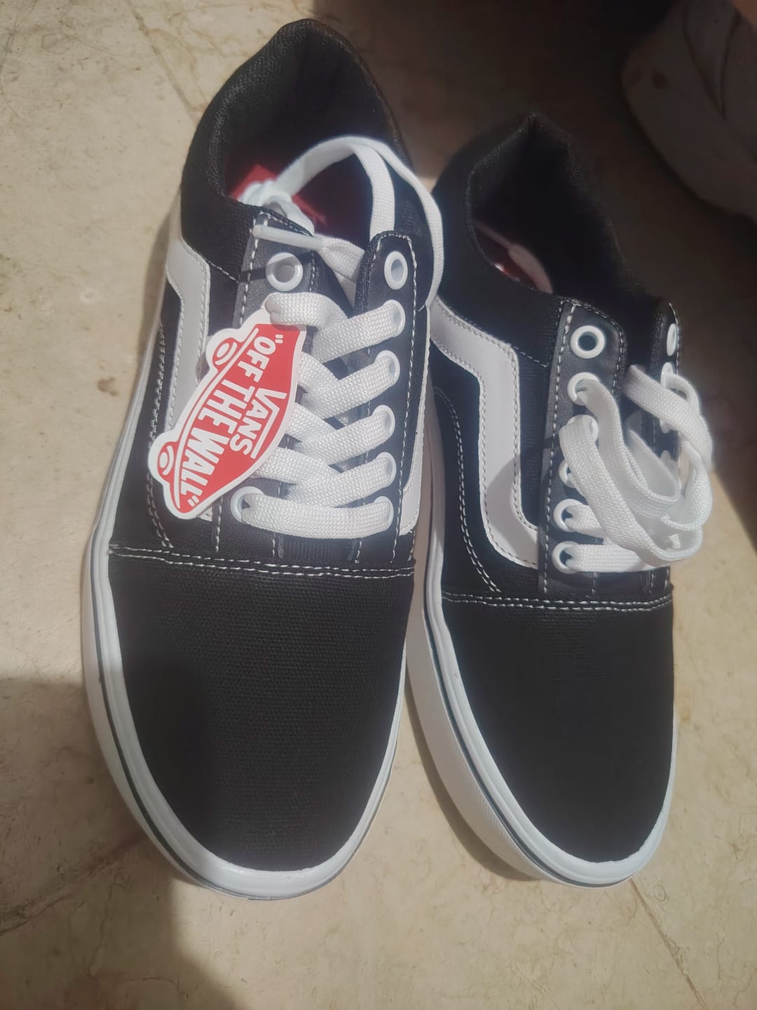 Customer photo review of Tenis 175 Choclo Negro Blanco