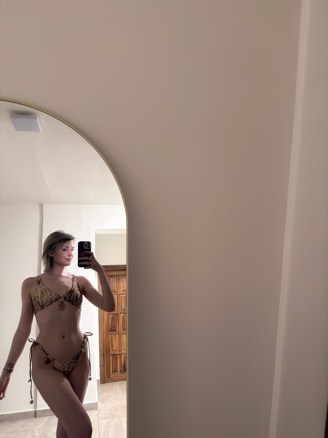 Customer photo review of ROMY HIGH APEX BIKINI TOP