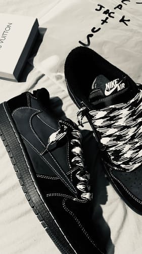 Customer photo review of Travis Scott x Air Jordan 1 Retro Low Black Phantom