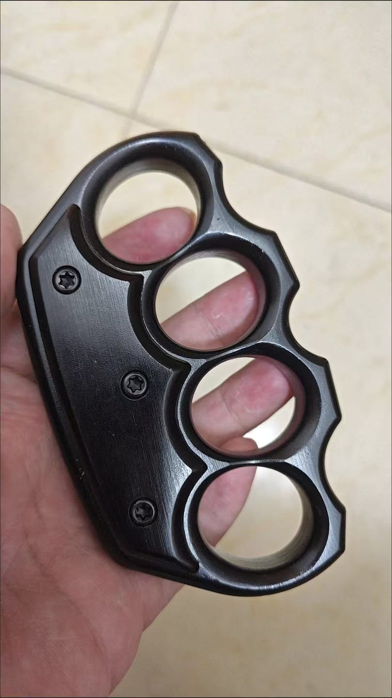 Customer photo review of Stainless Steel Knuckle Duster Paperweight