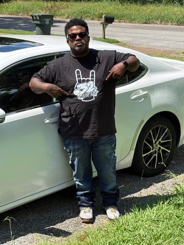 Customer photo review of 32 GANG BUDGET TEE