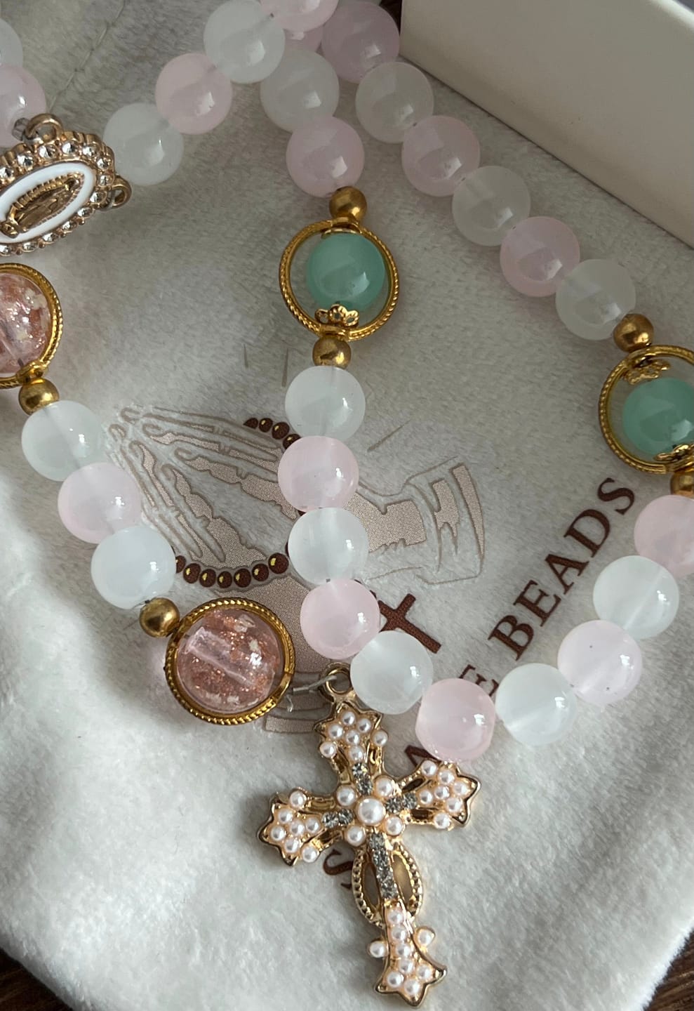 Customer photo review of SolaceBeads Artistic Pink & White Beaded Rosary: A Fusion of Colors & Sacred Symbols