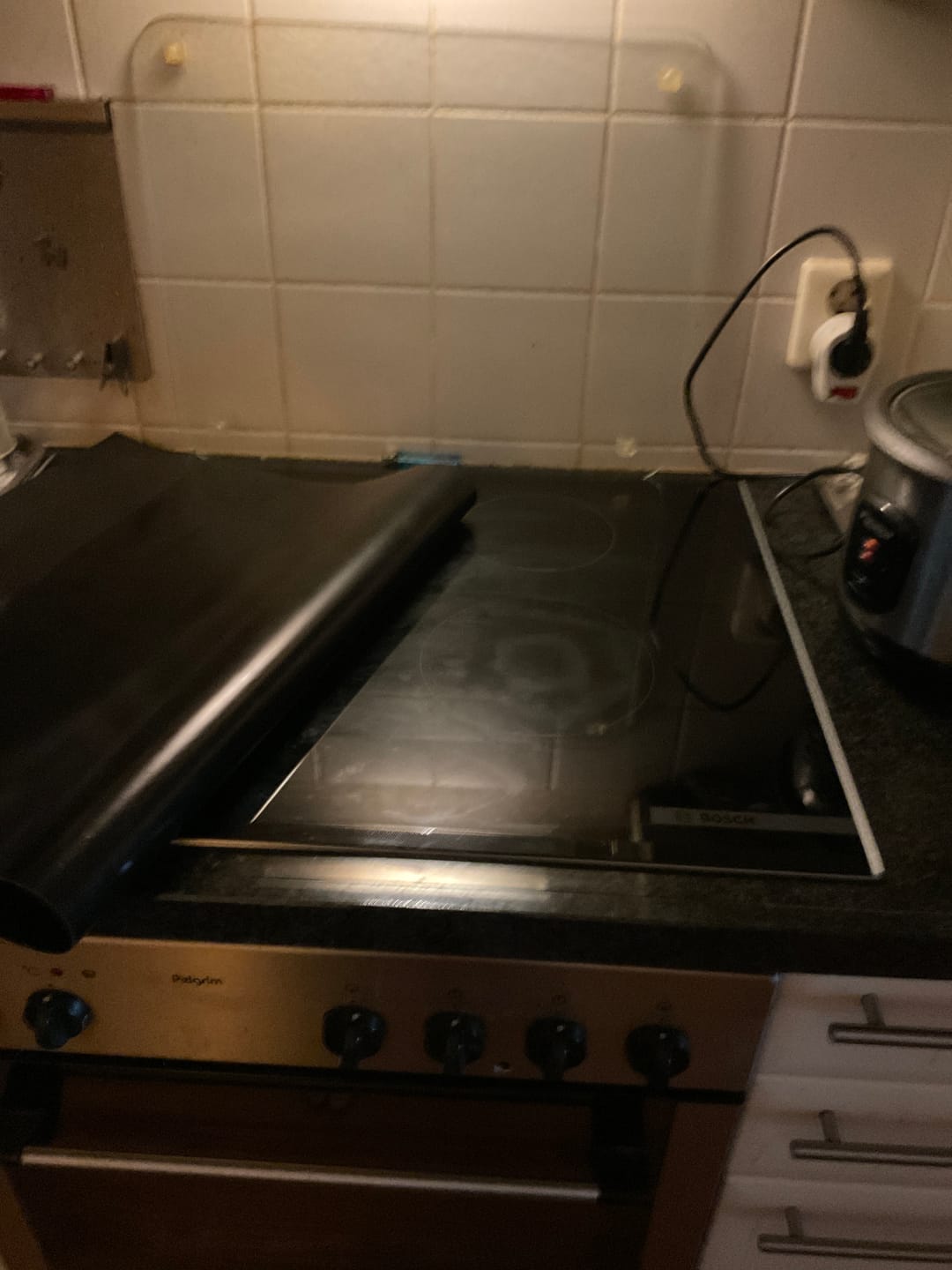 Customer photo review of Inductiebeschermer - Effen - Zwart - Donker