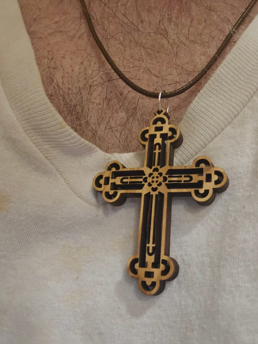 Customer photo review of Holy Land Carved Clover-Ends Cross Pendant